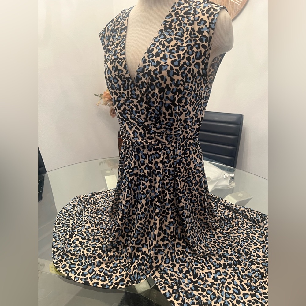 Beautiful BCBG leopard dress/ blue great stretchy fabric size medium like new!